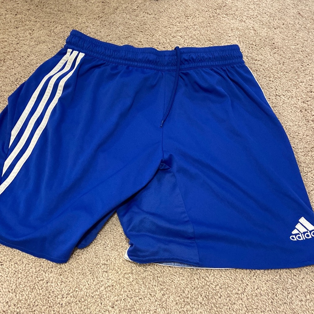Blue Adidas soccer shorts. Size large